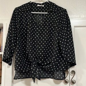 Beige and black polka dot blouse